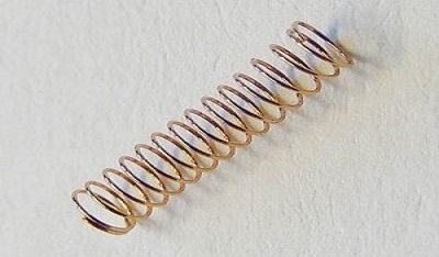Kuplungrugó 7,5x1,7x0,12mm.